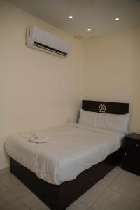 Katil atau katil-katil dalam bilik di THE PYRAMIDS HOTEL VIEw