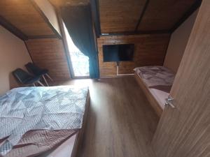 Postel nebo postele na pokoji v ubytování Vila Mesko