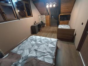 Postel nebo postele na pokoji v ubytování Vila Mesko