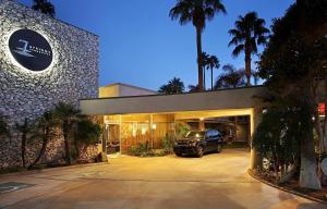 a car parked inside of a building with a garage at 7 Springs Inn & Suites in Palm Springs