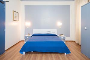 Postel nebo postele na pokoji v ubytování Hotel Sole