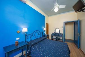 Postel nebo postele na pokoji v ubytování Hotel Sole