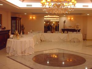 Nápoje v ubytovaní Hotel Roscianum Welness SPA