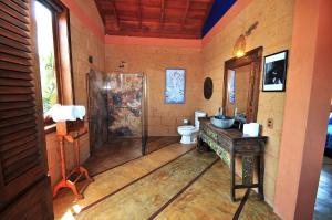 a bathroom with a shower and a toilet at Hotel Casa San Pancho in San Francisco