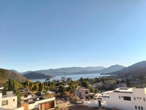 a view of a city and a body of water at Nuevos departamentos en Valle de Bravo in Valle de Bravo
