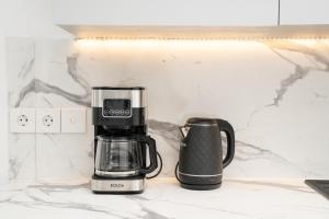 Kaffe- og tefaciliteter på Surga Homes In Kuta, Lombok