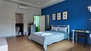 Postel nebo postele na pokoji v ubytování Vii House Rawai Phuket