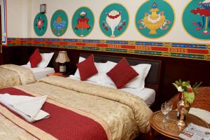 Letto o letti in una camera di Kathmandu Eco Hotel