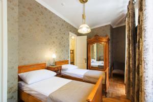 Voodi või voodid majutusasutuse Bloom Boutique Hotel toas