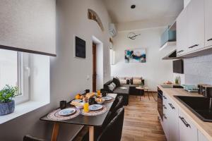 Kuchyň nebo kuchyňský kout v ubytování Domus Tua