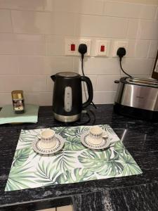 Příslušenství pro přípravu čaje a kávy v ubytování Ocean Breeze Hawana + 17 fotografií