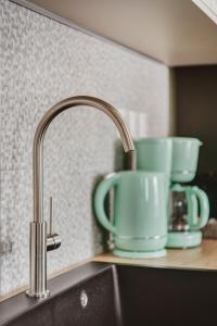 Příslušenství pro přípravu čaje a kávy v ubytování Domus Tua + 34 fotografií