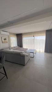 Postel nebo postele na pokoji v ubytování CasaMare Lagonisi Athens Riviera Luxury modern villas apartment's