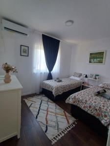 Ένα ή περισσότερα κρεβάτια σε δωμάτιο στο Villa Mima Stolac +19 φωτογραφίες