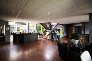 The lobby or reception area at Ambiance Hotel