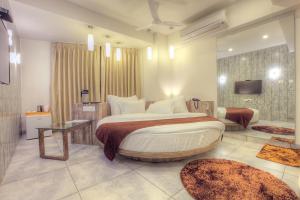 Postel nebo postele na pokoji v ubytování Scenaria Hotel + 36 fotografií