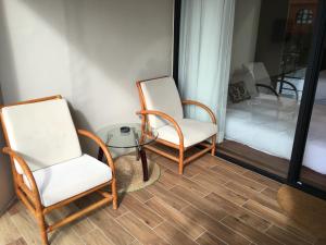 Voodi või voodid majutusasutuse Palm Tree Hotel Kenting toas