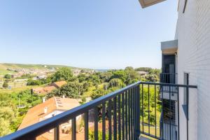 a view from the balcony of a house at Soto de la Marina I Parking Privado I Wifi I Playa in Soto de la Marina
