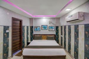 Katil atau katil-katil dalam bilik di OYO 81208 HOTEL TERRENE EMPIRe