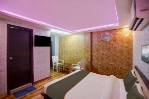 Katil atau katil-katil dalam bilik di OYO 81208 HOTEL TERRENE EMPIRe
