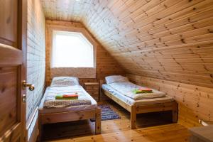 מיטה או מיטות בחדר ב-Soosaare Holiday House