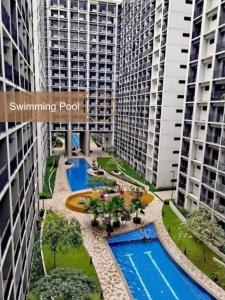 a rendering of the swimming pool in a apartment complex at Modern Unit at Shore 2 Mall of Asia by Elle Suite in Manila