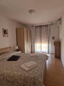 Postel nebo postele na pokoji v ubytování Apartment Mirela