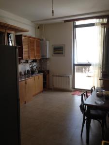 Kuchyň nebo kuchyňský kout v ubytování Art Guesthouse