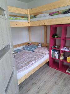 Postel nebo postele na pokoji v ubytování Byteček u Monči