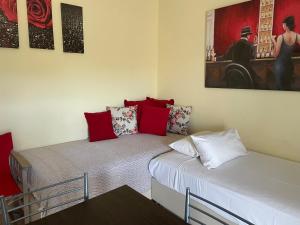 A bed or beds in a room at Cavo Plako Villas