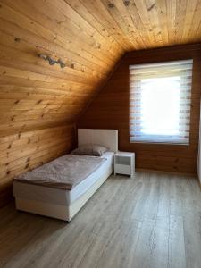 Postel nebo postele na pokoji v ubytování Royal Haven