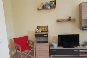 A television and/or entertainment centre at Cavo Plako Villas
