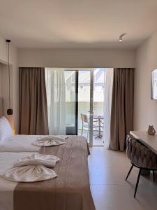Postel nebo postele na pokoji v ubytování Golden Coast Suites