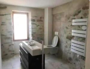 Koupelna v ubytování Vue sur les montagnes Corses