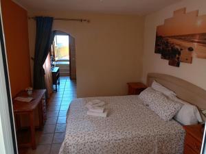 Postel nebo postele na pokoji v ubytování Tenerife Paradise Room 108 + 26 fotografií