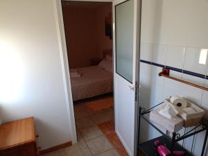 Postel nebo postele na pokoji v ubytování Tenerife Paradise Room 108