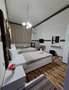 Ένα ή περισσότερα κρεβάτια σε δωμάτιο στο Hotel velvet One
