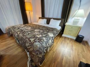 Postel nebo postele na pokoji v ubytování Guest House Koza Gate2