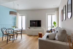 TV a/nebo společenská místnost v ubytování felino24parma - Il Borgo