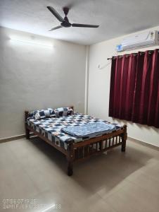 Katil atau katil-katil dalam bilik di Prateek's apartment near to the Krishna mutt