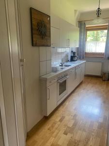 Kuchyň nebo kuchyňský kout v ubytování Haus Gantschnigg