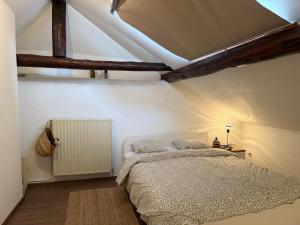 Ένα ή περισσότερα κρεβάτια σε δωμάτιο στο Chambre chez l'habitant 3 - Longwy bas