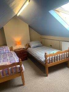 Ένα ή περισσότερα κρεβάτια σε δωμάτιο στο Room only guest accommodation, guest house self catering