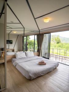 Un pat sau paturi într-o cameră la Hyde198homeresort +80 fotografii
