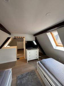 En eller flere senge i et værelse på Ferienhaus Lubentiusblick Limburg