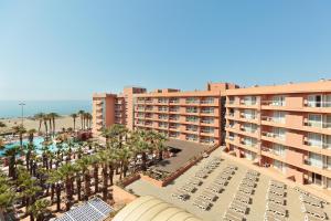 an aerial view of a resort with palm trees and the ocean at Hotel Best Roquetas in Roquetas de Mar +53 photos