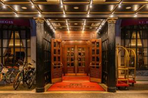 a front door of a building with bikes in front at The St. Regis Washington, D.C. in Washington, D.C.