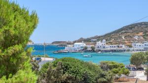 a view of a bay with boats in the water at All Welcome in Pollonia