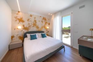Letto o letti in una camera di Villa Silvia Apartments