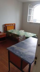 Postel nebo postele na pokoji v ubytování 3 Quartos SOBRADO VINTAGE